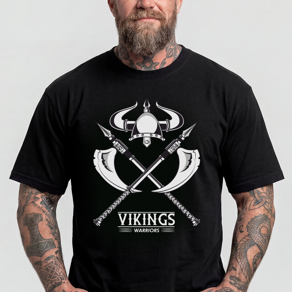 Man wearing a black t-shirt with Viking design and text on a plain background