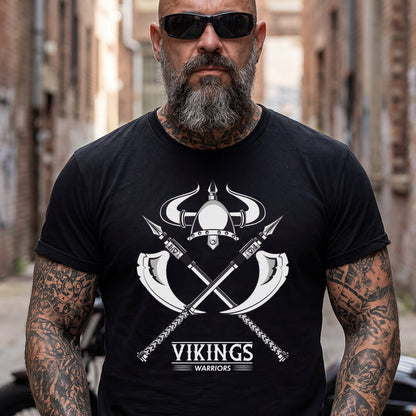 Man wearing a black t-shirt with a Viking Warriors Horned Helmet design and text, standing in an urban setting.