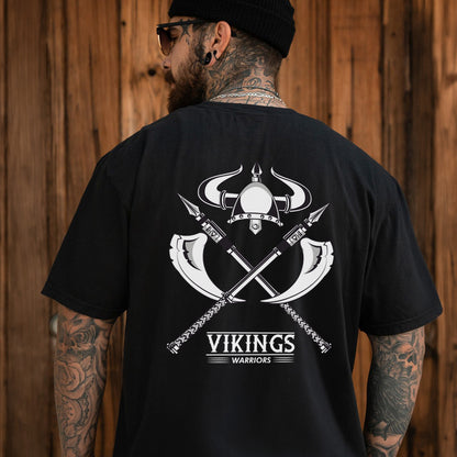 Man wearing a black t-shirt with Viking design and 'Vikings Warriors' text.