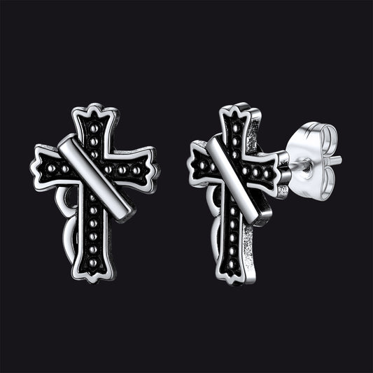 Close-up of vintage crucifix cross stud earring with antique finish, detailed retro religious jewelry for menimg
