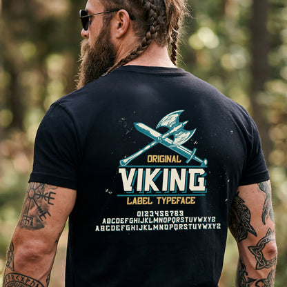 Man wearing a black t-shirt with 'Original Viking Label Typeface' design outdoors.