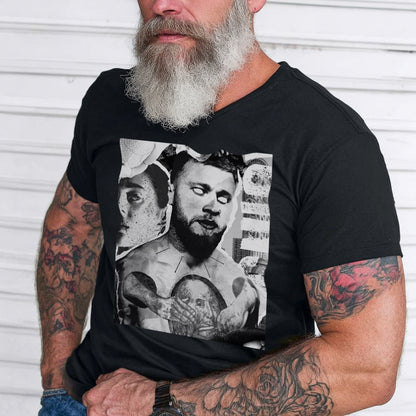Man wearing a black t-shirt with a graphic design of a man with tattoos and a beard.